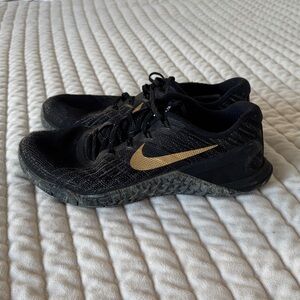 Nike Black and Gold Training Sneakers